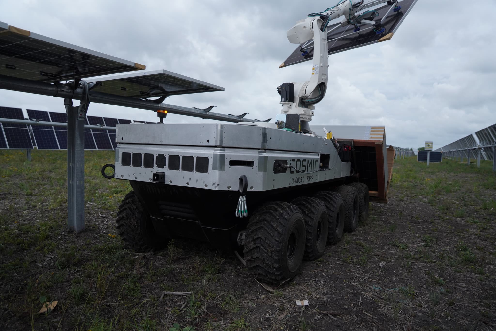Robot working beneath installed panels