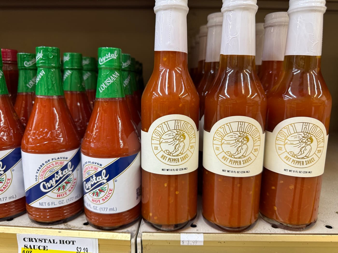 1971 Hook bottles on the hot-sauce shelf at Whole Foods Market
