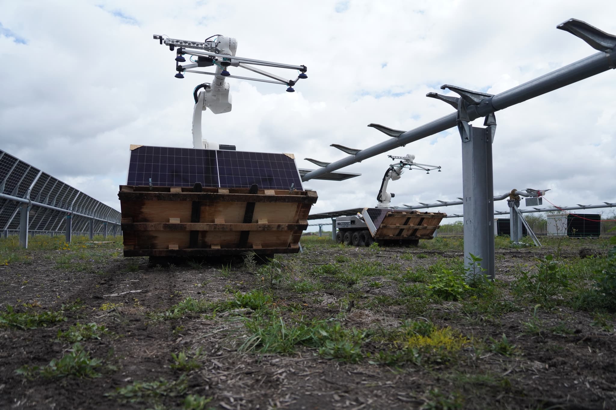 Two Cosmic-1 robots on a Southern Texas solar site, 2026